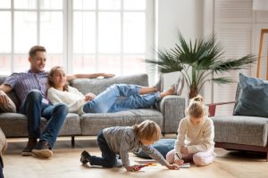 Air duct cleaning for Decatur home with happy family in living room